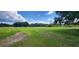 Open grassy lot with mature trees at 2661 Waccassa St, Geneva, FL 32732