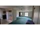 View of living room, kitchen, and access to exterior at 2661 Waccassa St, Geneva, FL 32732