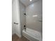 Bright bathroom with a tiled shower and modern fixtures at 282 Kimble Ave, Oviedo, FL 32765