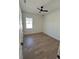 Spacious bedroom featuring wood-look floors and a ceiling fan at 282 Kimble Ave, Oviedo, FL 32765