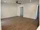 Spacious living room features wood-look tile flooring and recessed lighting at 282 Kimble Ave, Oviedo, FL 32765