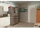 Bright kitchen featuring white cabinets and a stainless steel refrigerator at 1149 Holden Ave, Orlando, FL 32839
