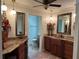 Bathroom features dual sinks, granite countertops, and tile floors at 3336 Edgecliffe Dr, Orlando, FL 32806