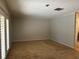Carpeted bedroom with trim and neutral walls at 3336 Edgecliffe Dr, Orlando, FL 32806