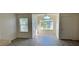 Simple dining area with wood-look floors and view to the outdoors at 4105 Tropical Isle Blvd # 238, Kissimmee, FL 34741