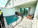 Private outdoor patio area features a splash pool, privacy walls and access to indoor living space at 7944 Formosa Valley Pl, Kissimmee, FL 34747