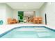 Inviting pool area with outdoor dining and lounge seating, perfect for relaxation and entertainment at 7944 Formosa Valley Pl, Kissimmee, FL 34747