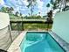 Secluded pool with safety fence providing a tranquil escape in the privacy of your own backyard at 7944 Formosa Valley Pl, Kissimmee, FL 34747
