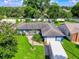 Aerial view of a single-Gathering home with a pool and fenced backyard at 1713 Longleaf Dr, Saint Cloud, FL 34769