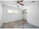 Spacious bedroom with tile floor and a large closet at 1713 Longleaf Dr, Saint Cloud, FL 34769