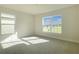 Bright bedroom with large windows, neutral walls, and plush carpeting at 4284 Sagefield Dr, Harmony, FL 34773