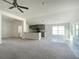 Bright and airy living room featuring an open layout, neutral color palette, and modern finishes at 4284 Sagefield Dr, Harmony, FL 34773