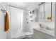 Clean bathroom with shower/tub combo and white vanity at 3334 Avenue J Nw, Winter Haven, FL 33881