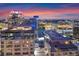 Stunning aerial view of the Orlando skyline with a colorful sunset backdrop at 155 S Court Ave # 2710, Orlando, FL 32801