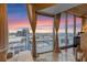Stunning city views from the balcony, framed by floor-to-ceiling windows and stylish curtains at 155 S Court Ave # 2710, Orlando, FL 32801