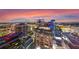 Mesmerizing city skyline at dusk featuring modern buildings illuminated with vibrant lights at 155 S Court Ave # 2710, Orlando, FL 32801