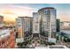 Stunning high-rise condo building boasting modern architecture, sleek glass facade, and luxurious urban living at 155 S Court Ave # 2710, Orlando, FL 32801