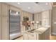 Bright kitchen with granite countertops, stainless steel appliances, and custom cabinetry for ample storage at 155 S Court Ave # 2710, Orlando, FL 32801