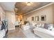 Spacious living room featuring neutral tones, a large sectional, and a view of the city at 155 S Court Ave # 2710, Orlando, FL 32801