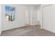 Bedroom with neutral carpet, natural light, and closet space at 4308 Ranch House Rd, Saint Cloud, FL 34772