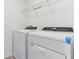 New washer and dryer in a bright laundry room at 4308 Ranch House Rd, Saint Cloud, FL 34772