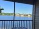 Relax on the balcony with scenic views of the serene lake at 1909 Summer Club Dr # 307, Oviedo, FL 32765