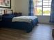 Calm bedroom with a comfortable bed, offering a relaxing space for rest at 1909 Summer Club Dr # 307, Oviedo, FL 32765
