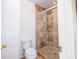 Bathroom featuring a stand up shower with glass door at 2246 Stonington Ave # 2246, Orlando, FL 32817