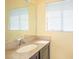 Bathroom with granite countertop and mirror at 2246 Stonington Ave # 2246, Orlando, FL 32817