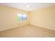 Bright bedroom with neutral carpet and natural light from the window at 2246 Stonington Ave # 2246, Orlando, FL 32817