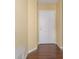 Inviting entrance hall with dark laminate flooring and neutral wall color at 2246 Stonington Ave # 2246, Orlando, FL 32817