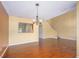 Open floor plan featuring hardwood floors and neutral wall colors at 2246 Stonington Ave # 2246, Orlando, FL 32817