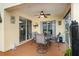 Relaxing screened patio with table and chairs at 4420 Hamlet Ct, Kissimmee, FL 34746