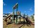 Modern playground with climbing structures and slides for children at 9440 Golden Laurel Ln, Orlando, FL 32827