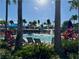 Refreshing pool with water features and plenty of lounge chairs at 9440 Golden Laurel Ln, Orlando, FL 32827