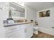 Modern bathroom with granite countertop and white cabinets at 1150 Carmel Cir # 201, Casselberry, FL 32707