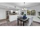 Bright dining room with chandelier and seating for six at 1150 Carmel Cir # 201, Casselberry, FL 32707