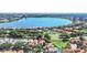 Aerial view showing home's location near a lake at 8168 Via Bella Notte, Orlando, FL 32836