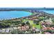 Aerial view of a lakefront property, highlighting its location and surrounding area at 8168 Via Bella Notte, Orlando, FL 32836