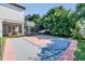 Enjoy recreational fun on this private backyard basketball court at 8168 Via Bella Notte, Orlando, FL 32836