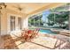 Enjoy this relaxing pool and spa area with covered patio at 8168 Via Bella Notte, Orlando, FL 32836