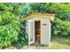 Private outdoor sauna nestled in lush landscaping at 8168 Via Bella Notte, Orlando, FL 32836