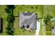 Top-down view of house, showing large yard and roof at 18920 Overton St, Orlando, FL 32833