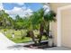 Long driveway leading to the garage with palm trees at 18920 Overton St, Orlando, FL 32833