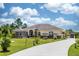 One-story house with long driveway and lush lawn at 18920 Overton St, Orlando, FL 32833