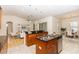 Island kitchen with granite counters and wood cabinets at 18920 Overton St, Orlando, FL 32833