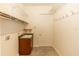 Laundry room with shelving, sink, and pegboard at 18920 Overton St, Orlando, FL 32833