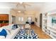 Living room with comfy seating and blue patterned rug at 18920 Overton St, Orlando, FL 32833