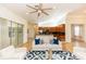 Open living area with kitchen view and hardwood floors at 18920 Overton St, Orlando, FL 32833