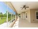 Spacious screened porch with ceiling fan at 18920 Overton St, Orlando, FL 32833